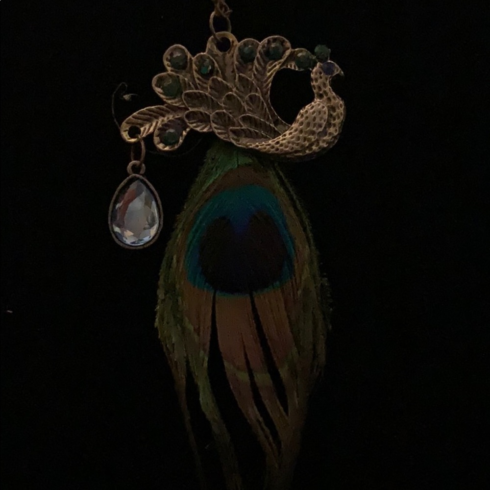 Peacock necklace with feather and green emeralds